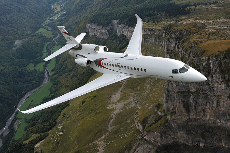 Corporate Aviation - Dassault Flacon 8x flying over cliffs 
