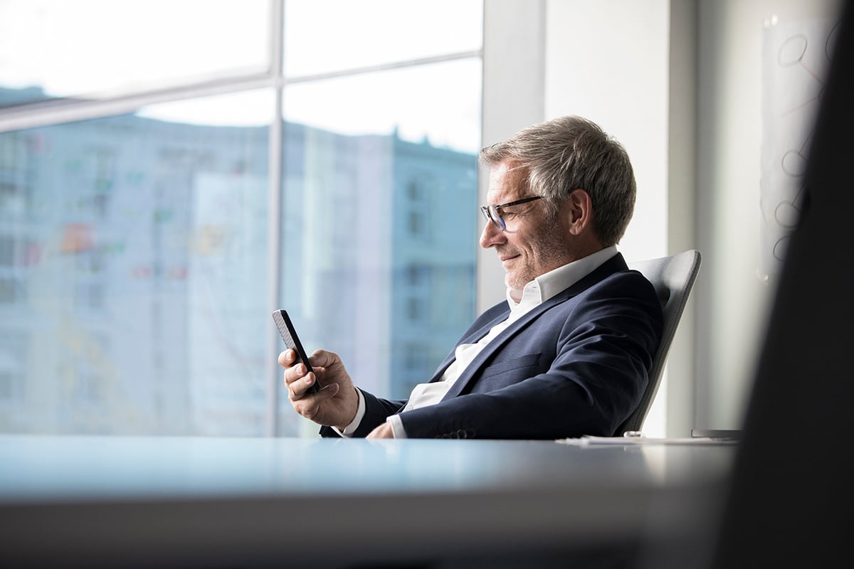 man waiting for private flight at small airport